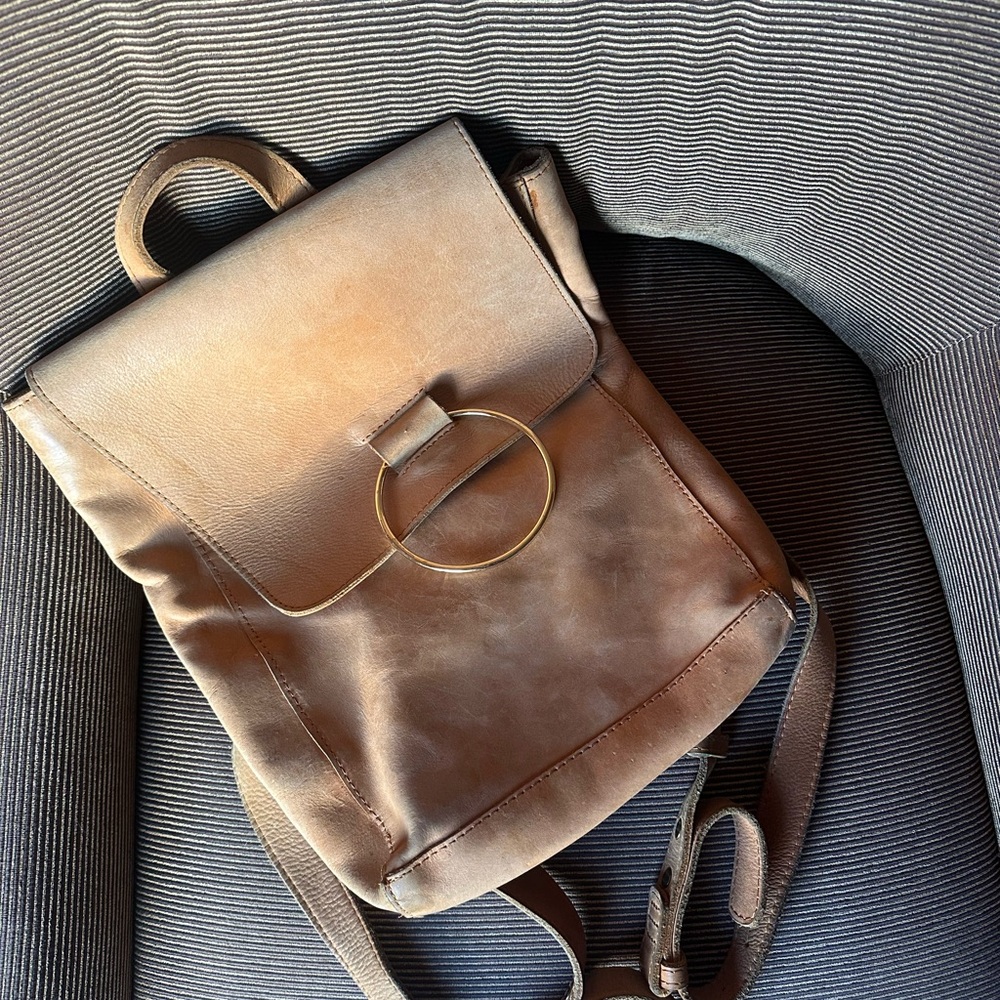 ABLE Stylish Brown Leather Backpack with Gold Ring Accent